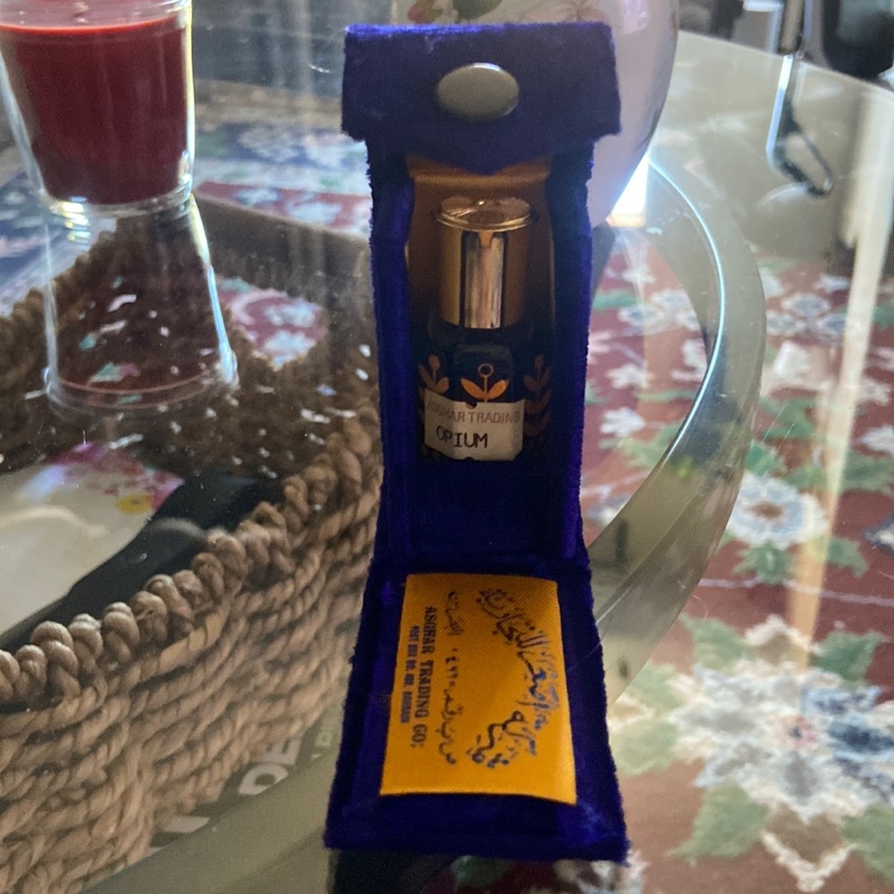 Opium Perfume in a pretty case